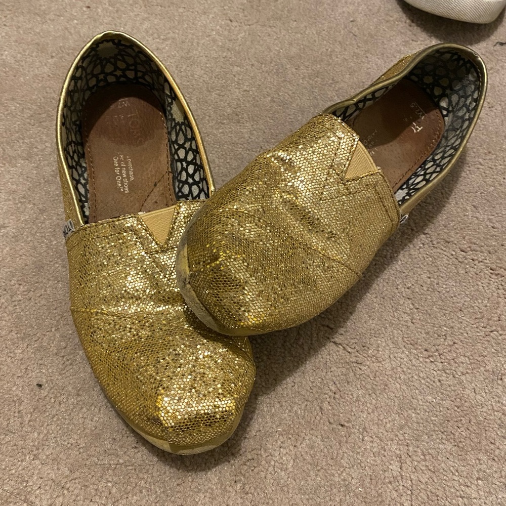 TOMS gold glitter shoes